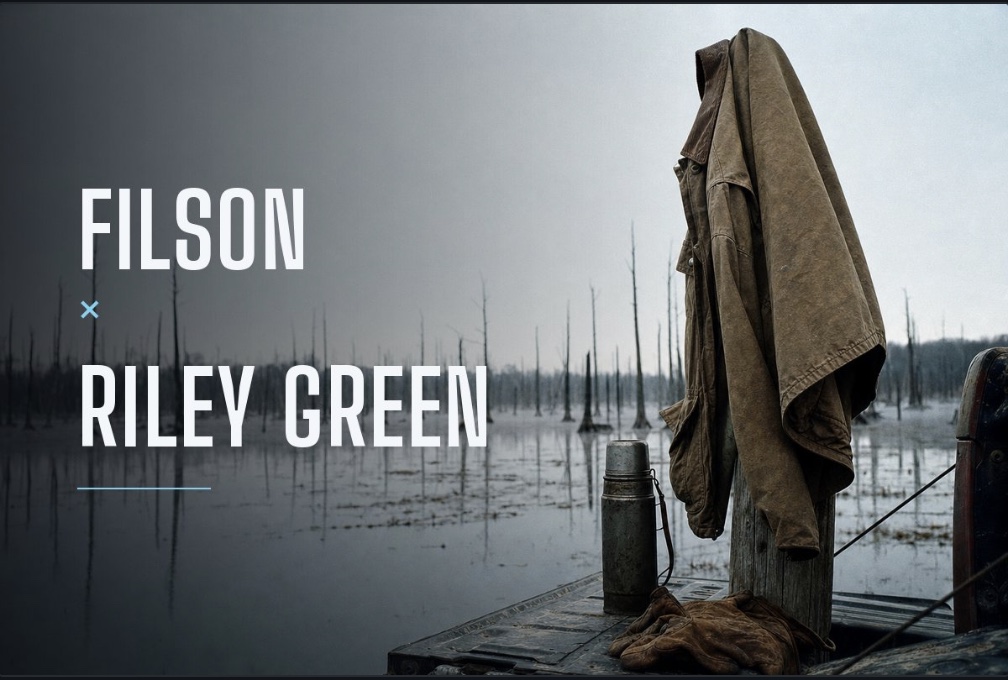 Illustrative concept card for Filson and Riley Green. A waxed cotton jacket hung on a post in flooded timber.